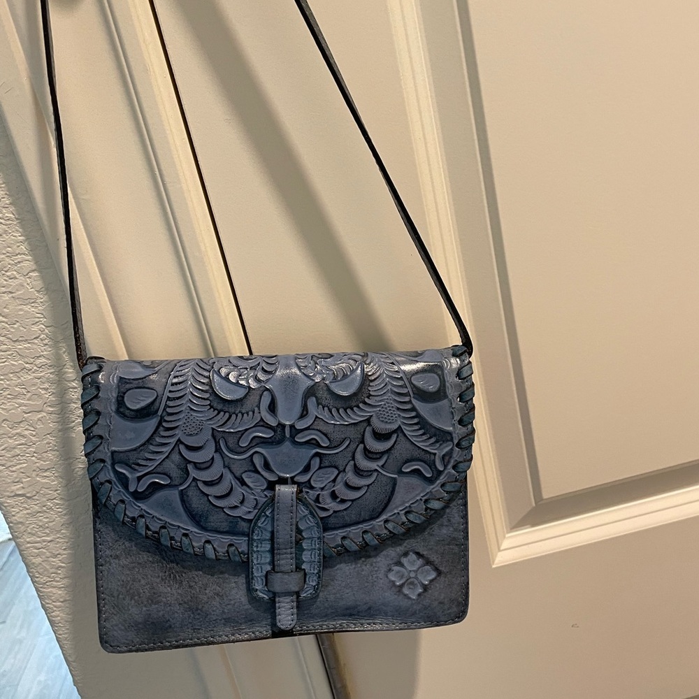 Patricia Nash blue handbag  color cloudy medium blue color that c in 1st picture
